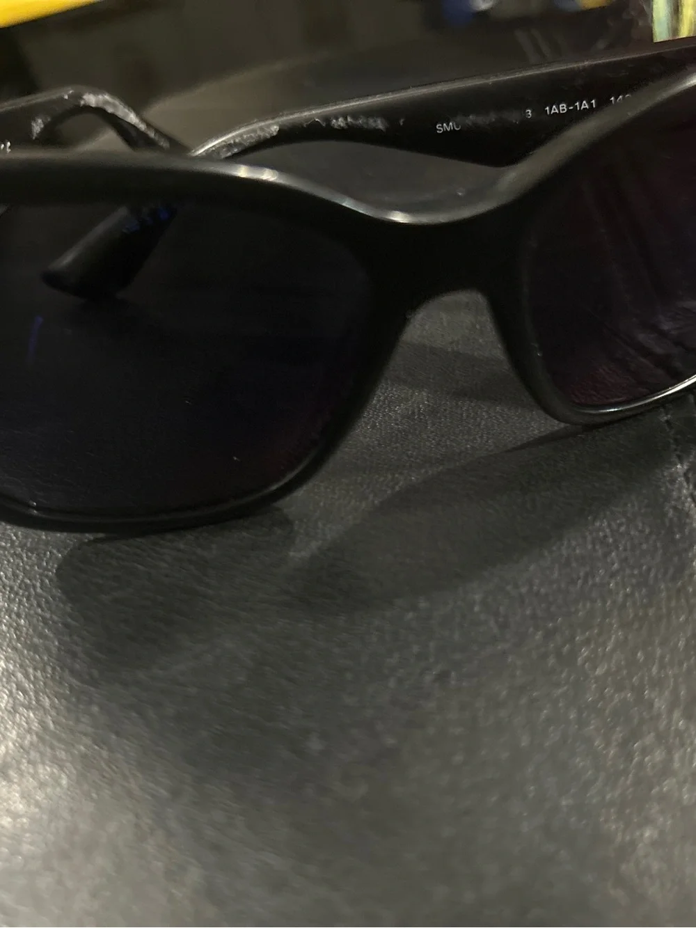 Miu Miu Black Cat-Eye Sunglasses with Dark Lenses